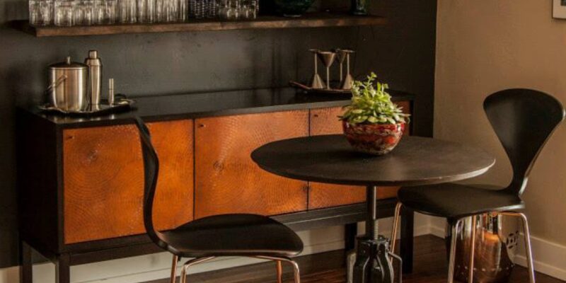 Moody bar and game room with a wine bar and a tall top table in Salt Lake City, UT.