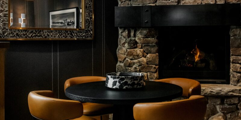 Moody and dark Utah dining room design featuring intentional details and a welcoming space for gathering.